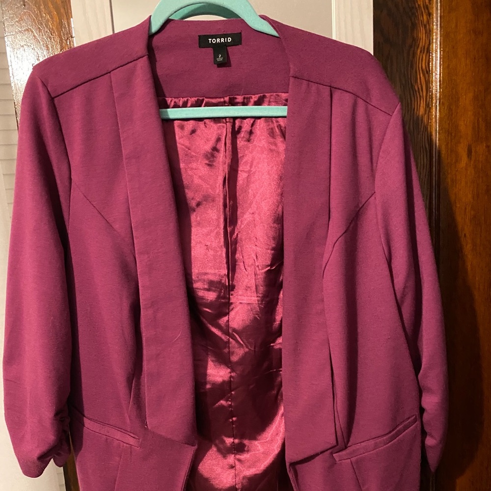Pink blazer with ruched sleeves